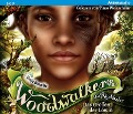 Buchcover: Woodwalkers - Die Rückkehr (Staffel 2, Band 3). Das Grollen der Löwin